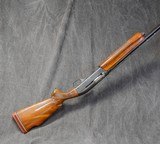 REMINGTON 1100 LEFT HAND, TB TRAP, 12-GAUGE/30