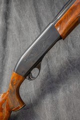 REMINGTON 1100 LEFT HAND, TB TRAP, 12-GAUGE/30