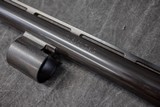 REMINGTON 1100 LEFT HAND,26