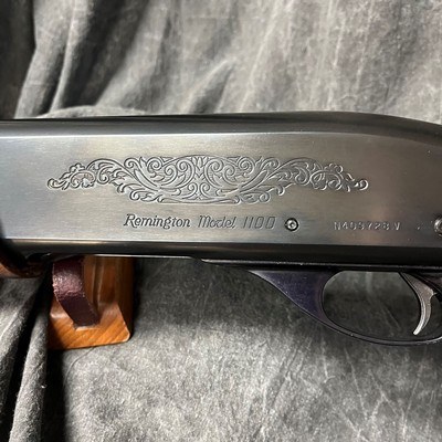 REMINGTON 1100 FIELD. 12-GAUGE/28