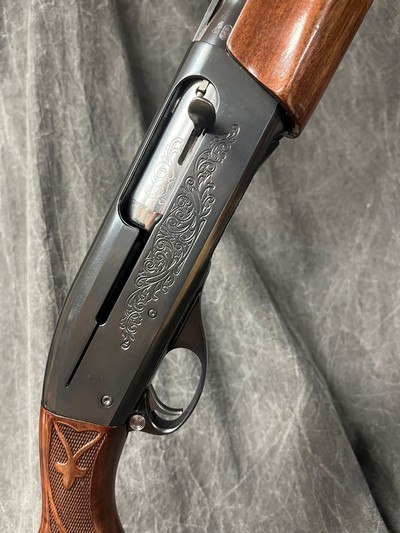 REMINGTON 1100 FIELD. 12-GAUGE/28