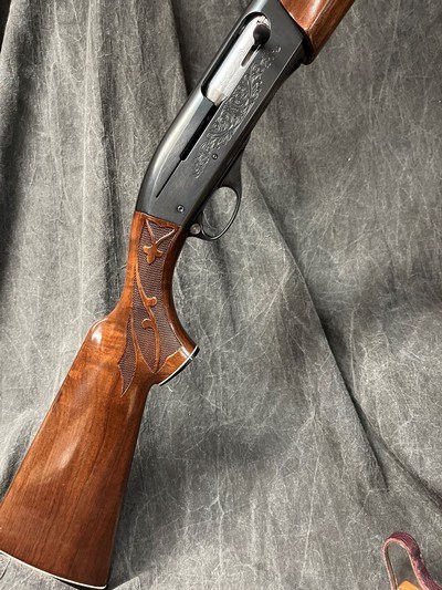 REMINGTON 1100 FIELD. 12-GAUGE/28