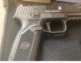 FN 509
mid size 9mm - 2 of 5