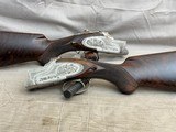 Custom Shop Factory Matched Pair of 12ga Browning B25 Superposed Shotguns in Fitted Case Engraved by J. P. Bailey - 1 of 25