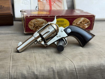 NIB with Display Case Colt Single Action Army 44 40 Sheriff's Model Nickel Finish with Ebony Grips