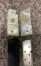 Colt mustang clips and grips 380acp - 1 of 5