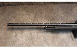 Mossberg~Maverick 88 - 5 of 5