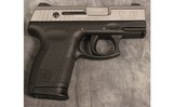 Taurus~PT145~.45 ACP - 1 of 2