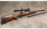 Sako ~ P04R Quad ~ .17 HMR & .22 Long Rifle - 1 of 10