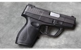 Taurus ~ Model 709 Slim ~ 9mm - 2 of 4