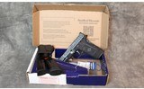 Smith and Wesson ~ Equalizer ~ 9mm - 1 of 5