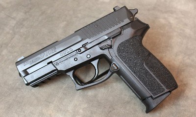 Sig Sauer ~ SP2022 ~ .40 S&W - Image 1 of 4