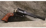 Ruger ~ New Model Super Blackhawk ~ .44 Magnum - 1 of 2