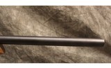 Remington ~ Model 597 ~ .22 Magnum - 5 of 10