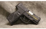Taurus ~ PT111 G2 ~ 9MM Luger - 1 of 2