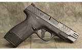 Smith & Wesson ~ M&P Shield Plus Carry Comp ~ 9mm Luger - 1 of 2