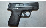 Smith & Wesson ~ M&P 9 Shield ~ 9mm Luger - 1 of 2