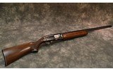 Remington~Model 1100~12 Gauge - 1 of 10