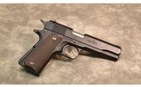 Browning~1911-22~.22 Long Rifle - 1 of 2