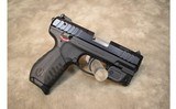 Ruger~SR22~.22 LR - 1 of 2