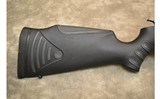 Thompson Center~Encore~.223 REM/.50 Cal - 2 of 11