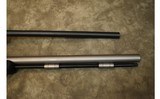 Thompson Center~Encore~.223 REM/.50 Cal - 5 of 11