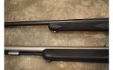 Thompson Center~Encore~.223 REM/.50 Cal - 9 of 10