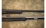 Thompson Center~Encore~.223 REM/.50 Cal - 3 of 10
