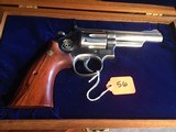 Smith and Wesson "VIRGINIA STATE POLICE 50TH ANNIVERSARY COMMEMORATIVE Model 66-1 .357 magnum caliber
PAIR
OF
REVOLVERS - 9 of 12