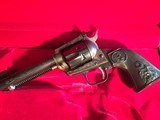 Colt New Frontier
"JOHN WAYNE COMMEMORATIVE" Revolver .22 long rifle - 2 of 10
