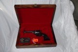 Colt New Frontier
"JOHN WAYNE COMMEMORATIVE" Revolver .22 long rifle - 7 of 10