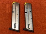 S&W Model 4006 .40 caliber original factory stainless steel magazines - 1 of 3