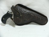 Colt 1877 Double Action 38 Colt Sheriff Model Lightning with holster - 1 of 5