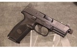 FN~509 Tactical~9MM - 1 of 3