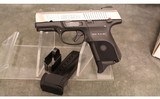 Ruger~SR9c~9 mm - 2 of 3