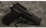 Sig Sauer~P220~45Auto - 1 of 3
