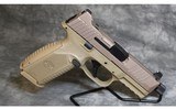 FN~509 Tactical~9MM - 1 of 3