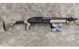 Mossberg~500~12 gauge - 1 of 7