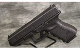 Glock~23~40 Auto - 2 of 3