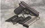 Sig Sauer~P220~45 Auto - 1 of 3