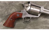 Ruger~New Model Super Blackhawk~44 Mag - 2 of 4