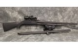Mossberg~500~12 gauge - 1 of 4
