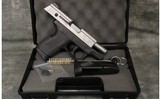 Taurus~PT140~40 S&W - 3 of 4