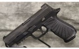 Sig Sauer~P320~9mm - 2 of 4