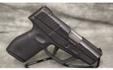 Taurus~709 Slim~9mm - 1 of 3