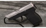 Taurus~PT738~380 Auto - 2 of 3