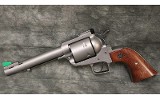 Ruger~New Model Super Blackhawk~44 Magnum - 2 of 2
