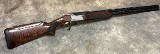 Browning~825 Sporting~12 Gauge - 1 of 8