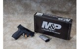 Smith & Wesson ~ M&P9 Shield ~ 9mm Luger - 1 of 3