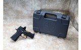 SIG Sauer ~ P320 XCarry Spectre ~ 9mm Luger - 1 of 3
